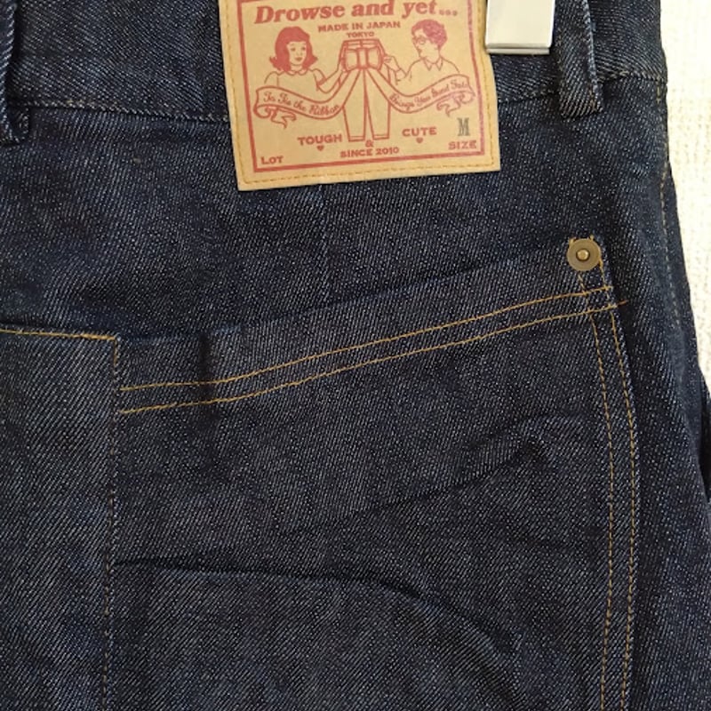 Drowse and yet...Back Ribbon Denim Pants | Shok