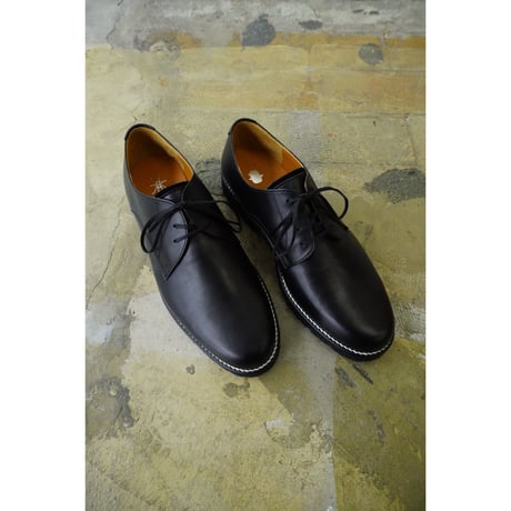 ASYMMETRIC SERVICE SHOES