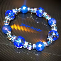 ブルー龍彫り水晶 オーラ カルセドニー64面カット(染め) 天然石ブレスレット