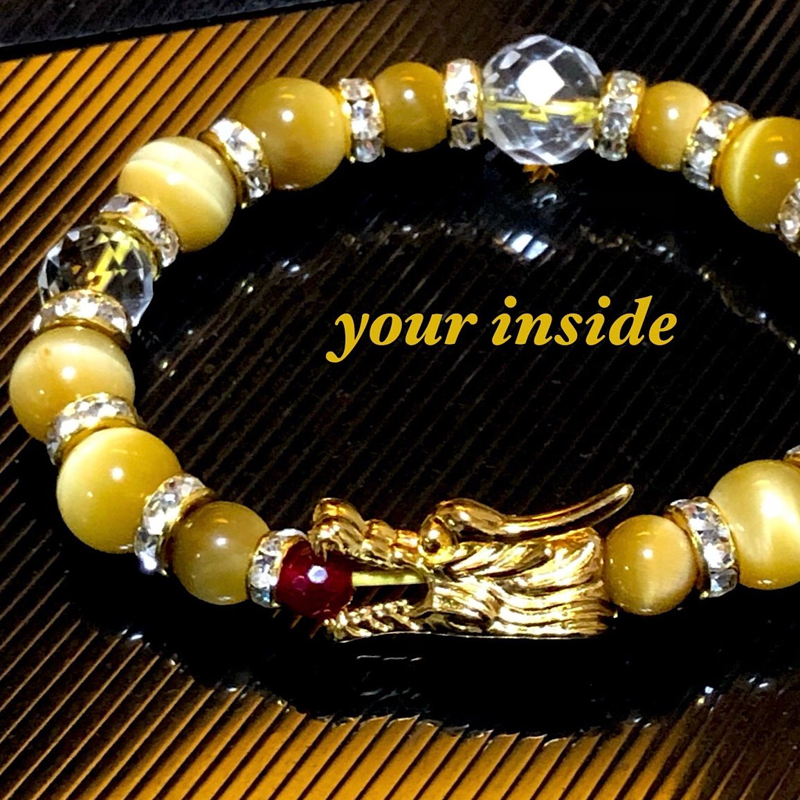 ドラゴンヘッド 龍 ゴールデンタイガーアイ 64面カット水晶 天然石