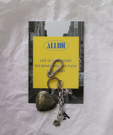 meta heart / key charm