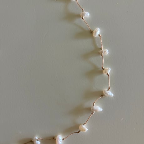 Natural pearl cord necklace