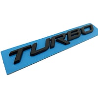 mj201 / ターボ TURBO 文字エンブレム / ブラック / 斜体 全大文字 R長い / 143×20mm / 社外品