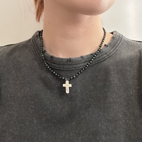 shell cross charm necklace.