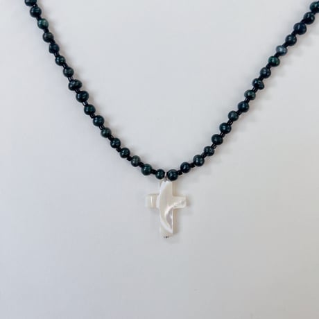 shell cross charm necklace.