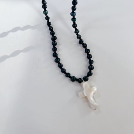 shell cross charm necklace.