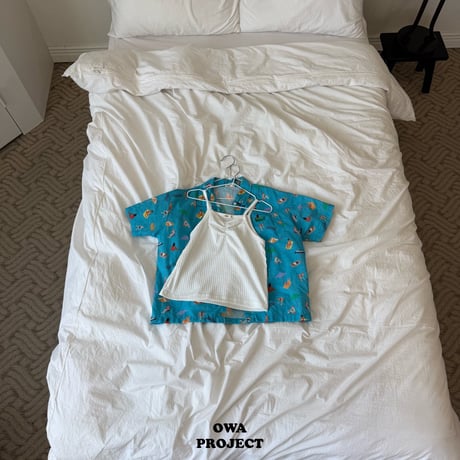 owa/70. memory sleeveless JS