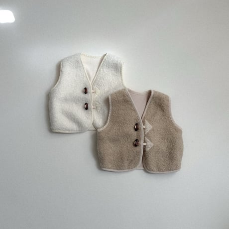 minirobe/16. Dumble vest S-XL