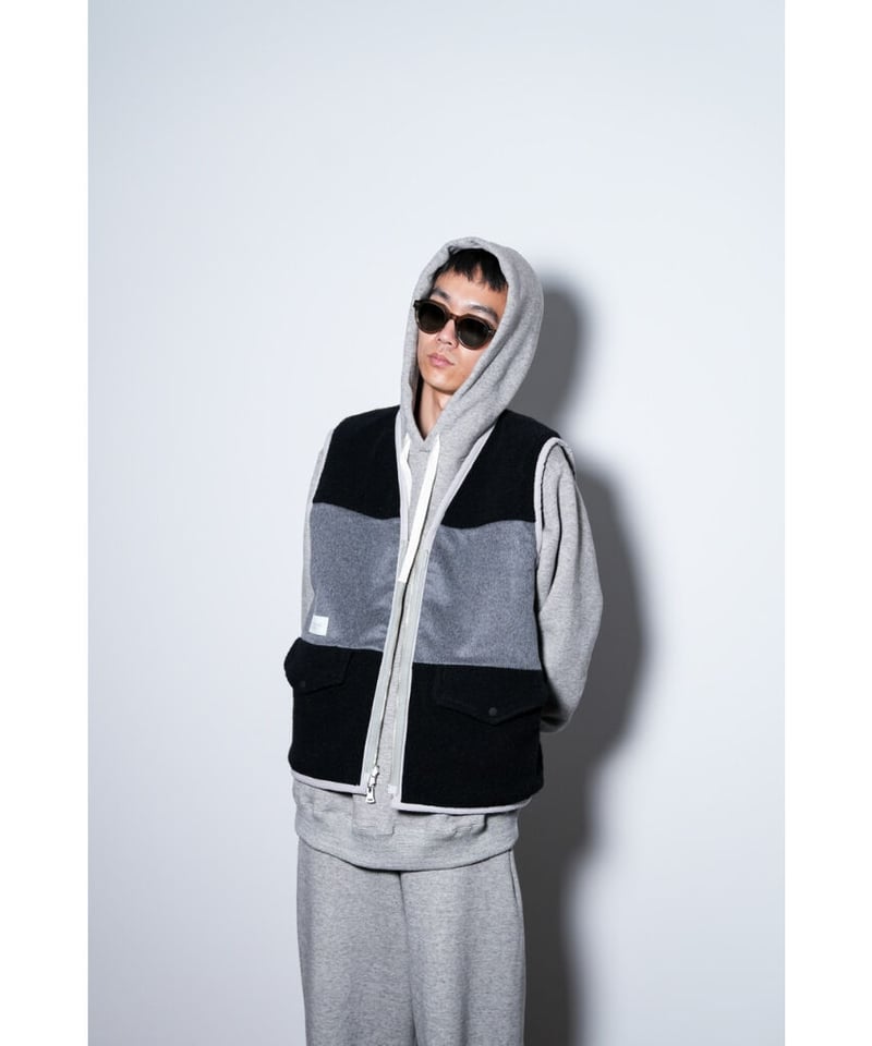 ENCOMING FRONT ZIP REVERSIBLE VEST | MusterWerk