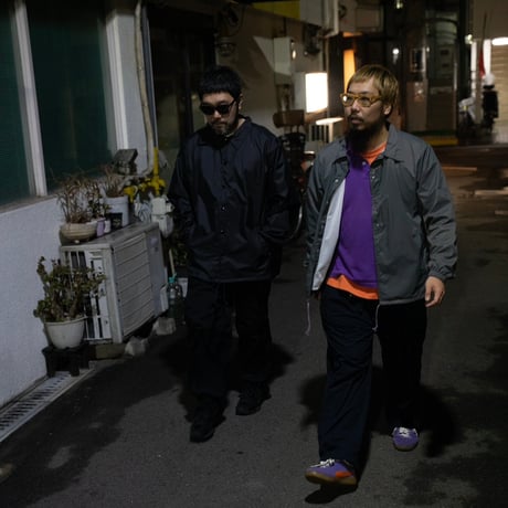 A(C) × HIGE COACH JACKET black