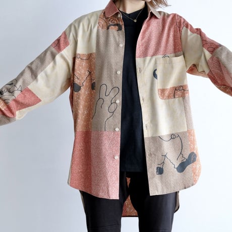 N.C.  "O.F SHIRT"  character orange