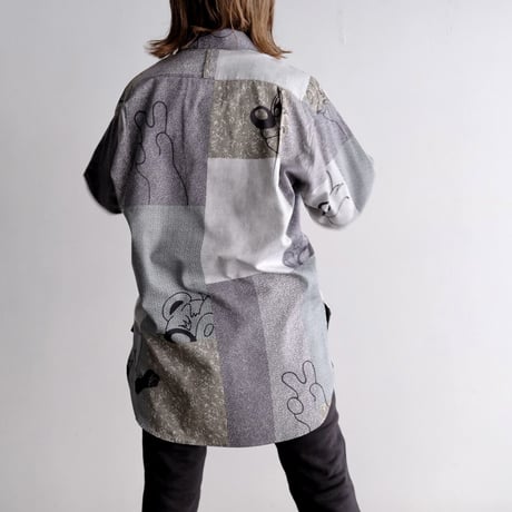 N.C.  "O.F SHIRT"  character gray