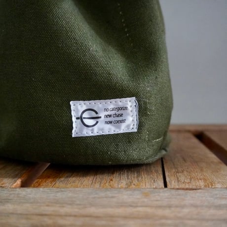 THE CORE OF THINGS × N.C reversible pouch bag solid 1