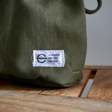 THE CORE OF THINGS × N.C reversible pouch bag solid 3