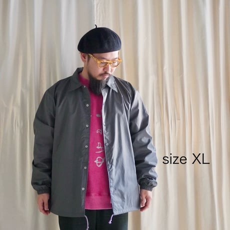 A(C) × HIGE COACH JACKET cement