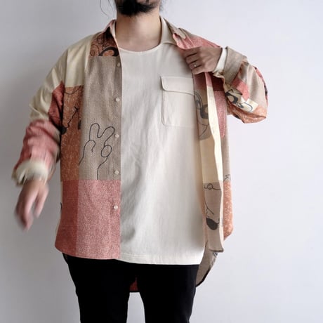 N.C.  "O.F SHIRT"  character orange