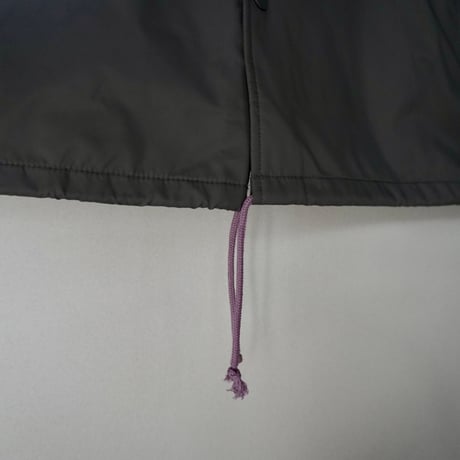 A(C) × HIGE COACH JACKET cement