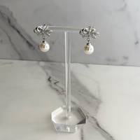 Ribbon × Pearl pierce / silver925