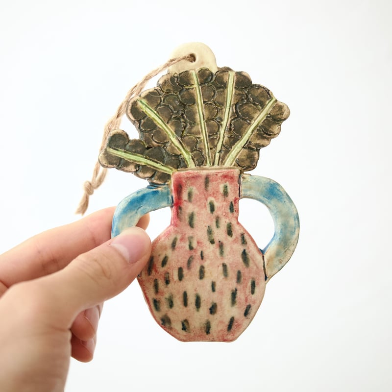 花瓶にささったほうれん草の壁掛け | Boris Pottery | daughter