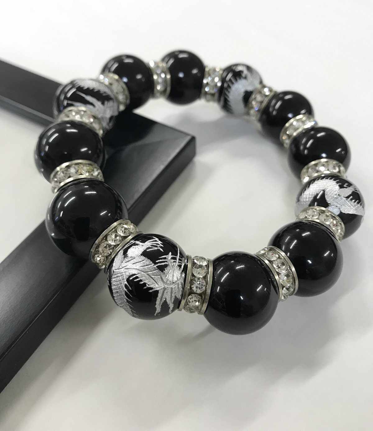 ハブ玉ブレスレット オニキス龍虎銀彫り、日本製