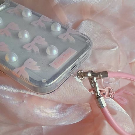 【iPhone17対応】パールリボンチャームストラップ付iPhoneケース