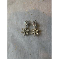 antique glass flower motif pierces