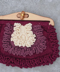 frill pink purple clutch bag