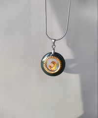 馬inside turn necklace