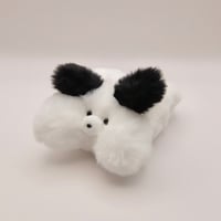 風になるふわふわ犬