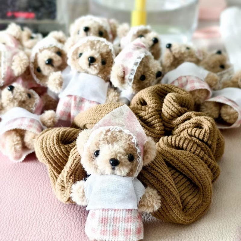 海外ライター【布岛小喵】ピンクチェックの小さな茶色いクマです