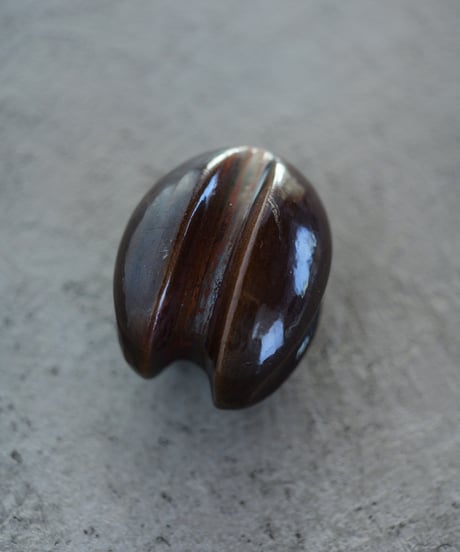 ceramic insulator or  coffee bean