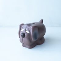 A Dog With Sad Face / Piggy-Bank