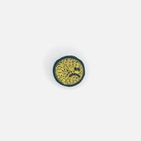 刺繍ブローチ / Unhappy face