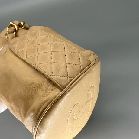 CHANEL (シャネル) ヴィンテージ ラムスキン ココマーク ベージュ 巾着 ハンドバッグ