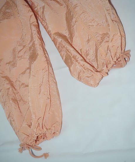 salmon pink nylon parachute pants
