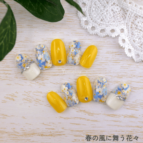 春の風に舞う花々