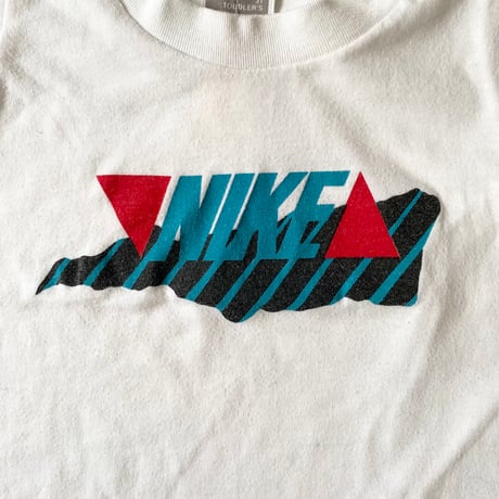(90)90'NIKE T