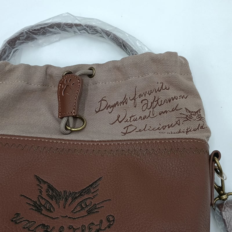 ダヤン レザーコンビ ミニ 巾着ショルダーバッグ 茶 | 秀和美術本店 わ