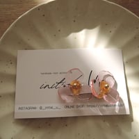 Lucky flowerのイヤリング_クリアピンク