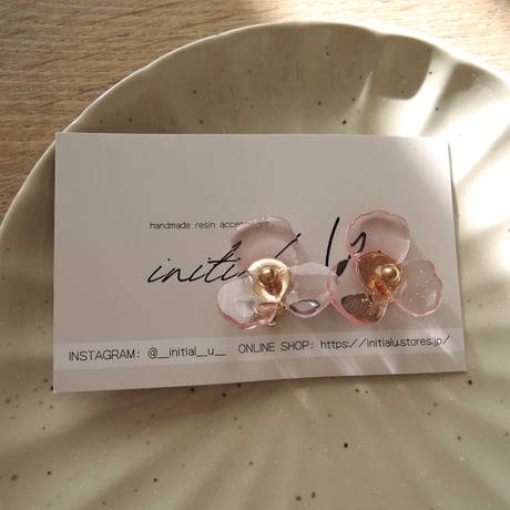 Lucky flowerのイヤリング_クリアピンク