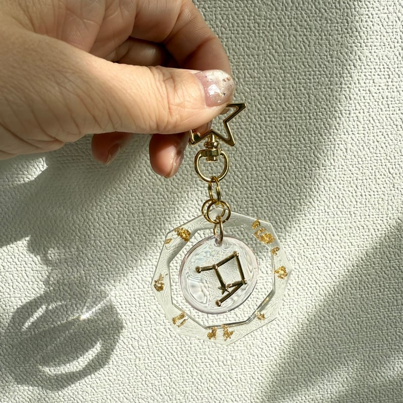 Happy SEIZAのキーホルダー_てんびん座_gold | initial U