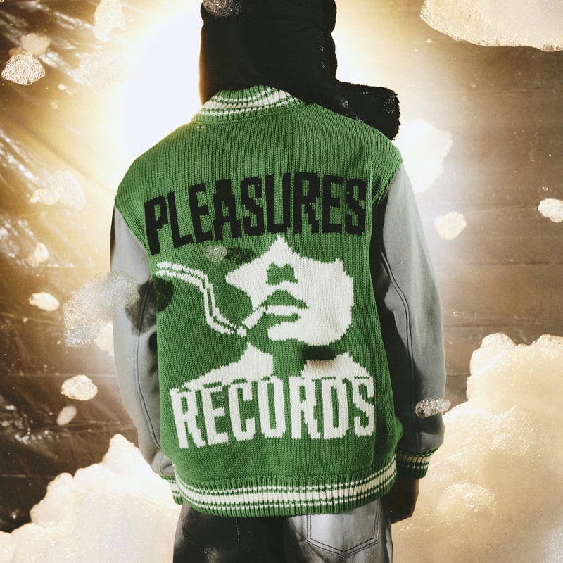 PLEASURES/プレジャーズ】SMOKE KNITTED VARSITY JACKET