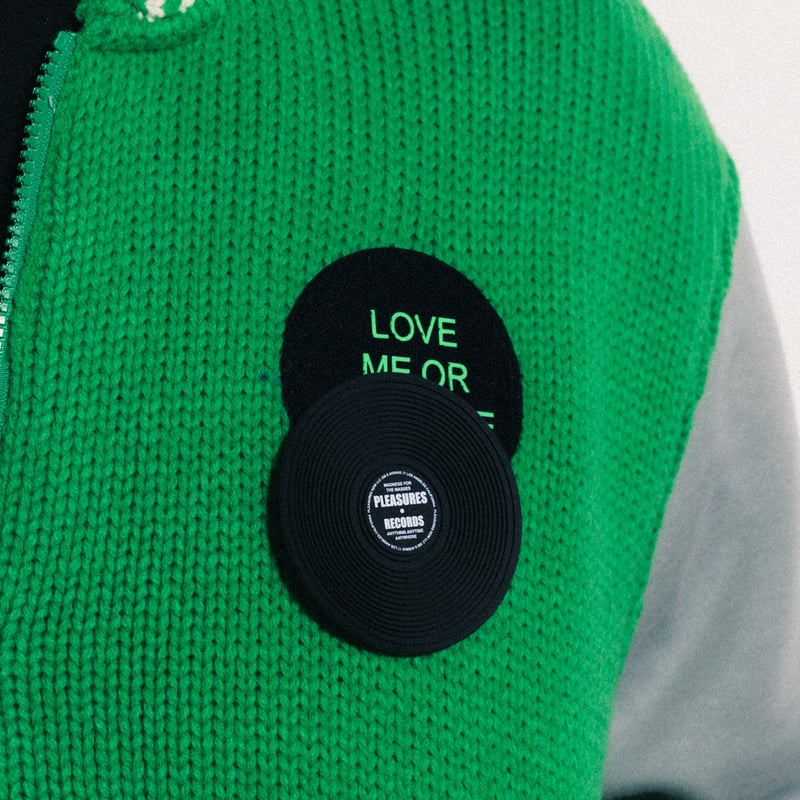 PLEASURES/プレジャーズ】SMOKE KNITTED VARSITY JACKET