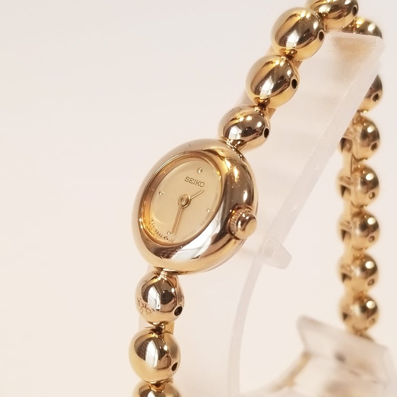 SEIKO セイコー レディース腕時計 ゴールド クォーツ 1E20-0070