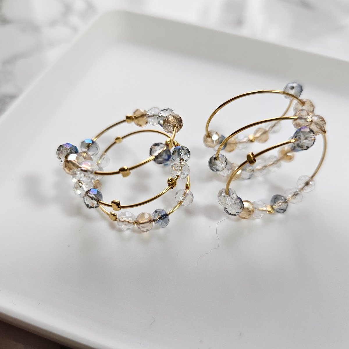 ●No.64  リング〈ガラスビーズ〉 ガラスビーズのステンレス4連コイルリング | la flore(ラ・フローラ)花