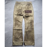 ISAMU KATYAMA BACKLASH】leather patch distressed pants