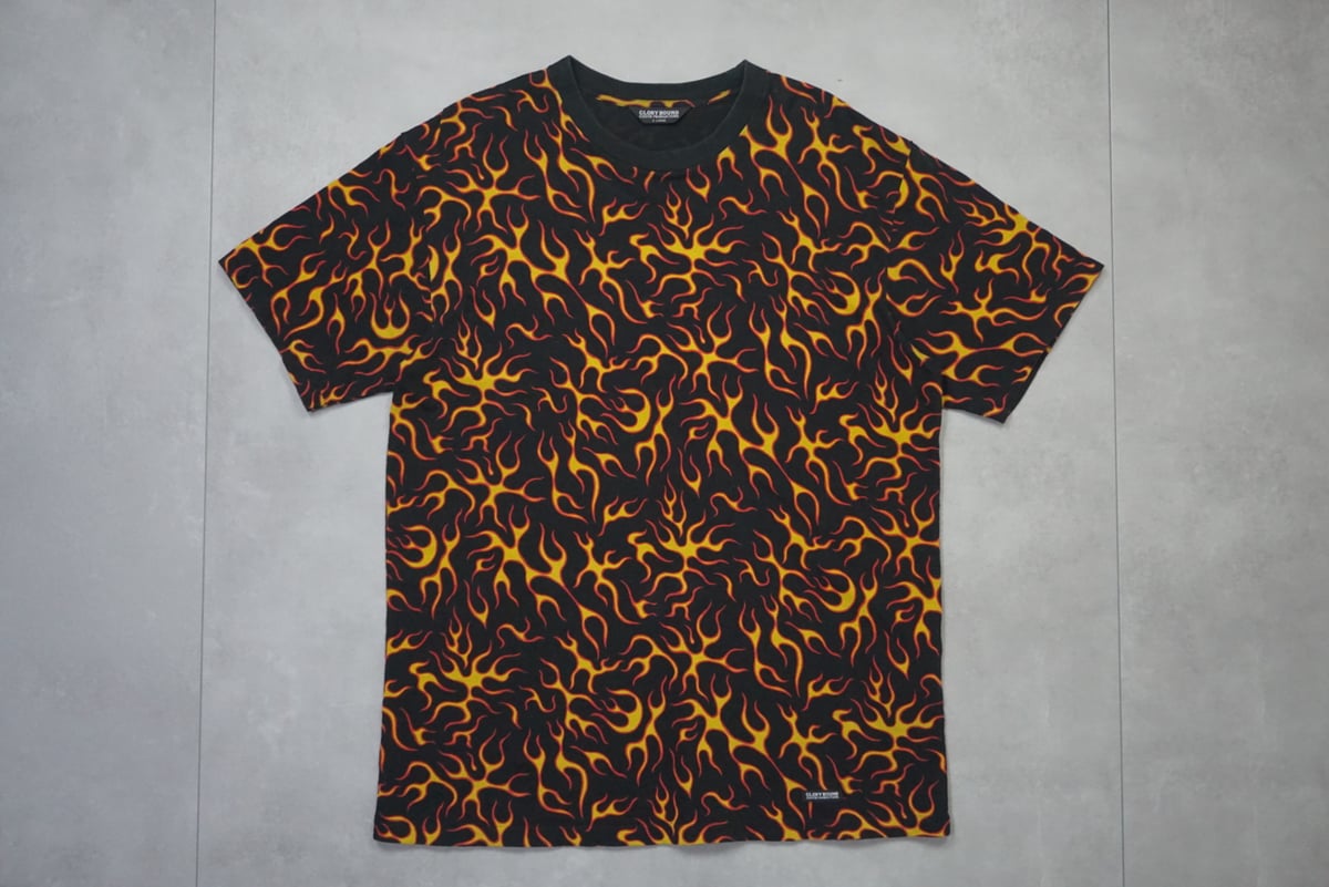 COOTIE PRODUCTIONS｜クーティープロダクションズ フレイム総柄Tシャツ