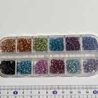 【109】1ケース600個300円・丸カン・アルミ・約6mm・12カラー