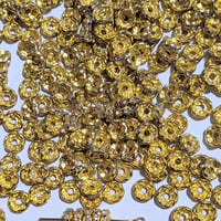 【63】100個100円・ロンデル・波形・約8mm・クリア×ゴールドカラー