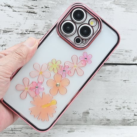 世界にひとつ！iPhone15Pro用レジンデコ付き着せ替えスマホケース・プルメリア・ピンク